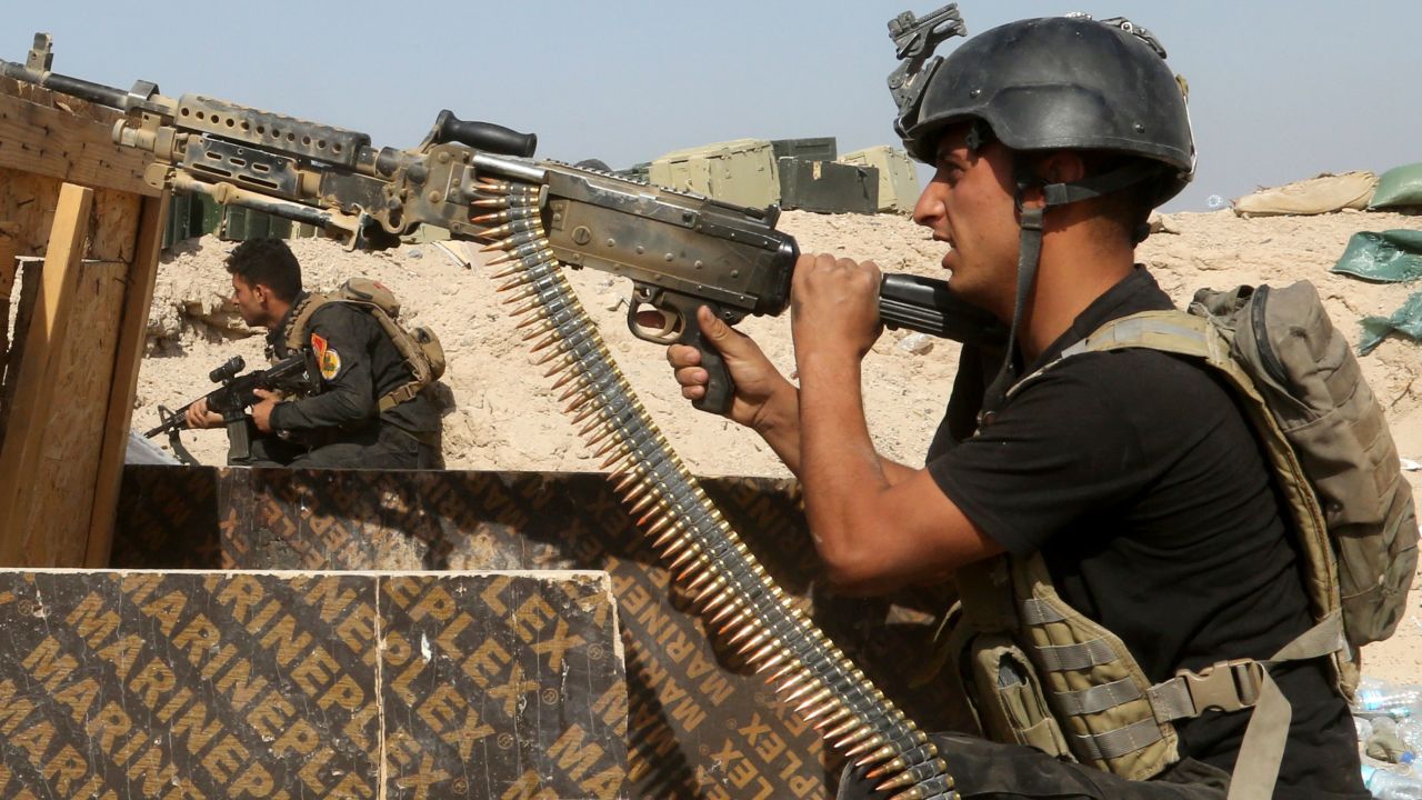 Iraqi counterterrorism forces face off with ISIS militants in Falluja's Nuaimiya neighborhood on Wednesday, June 1.