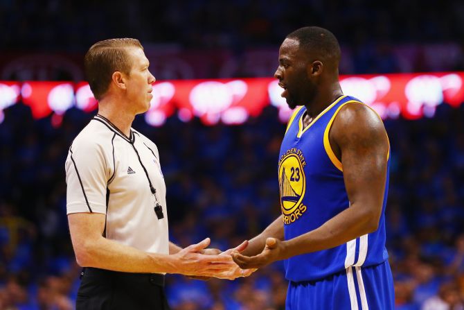 Draymond Green (right) of the Warriors pleads his case with a referee in the Western Conference Finals. Green is just one flagrant foul or two technical fouls away from a one-game suspension in the finals. 