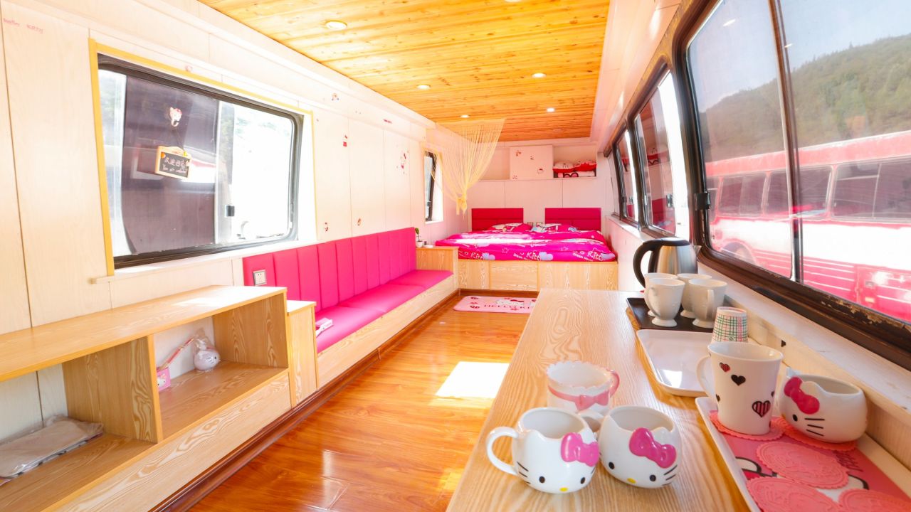 A Hello Kitty themed recreational vehicle at a resort on May 29, 2016 in Taiyuan, Shanxi Province of China. A resort spent more than 100,000 yuan (about 15,200 USD) to reconstruct decades of scrapped buses into different themed recreational vehicles with international standards. Kitchens, TVs, air conditions and bathrooms were available in the vehicles whose minimum daily rent was less than 200 yuan (about 30.4 USD) to attract the young people for camping items. Currently, the resort staff were stepping up reconstruction of the rest uncompleted "recreational vehicles" to meet the growing demand from customers.