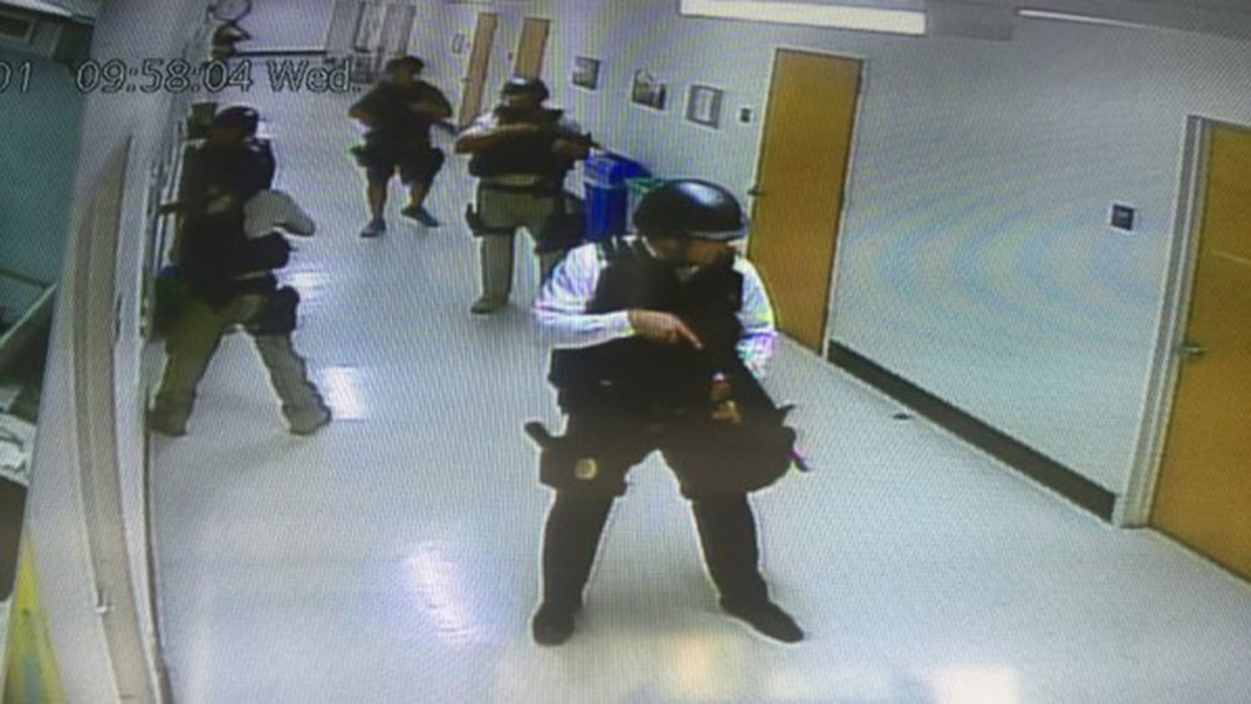 Law enforcement officials search a campus building on June 1. The photo was taken from one of the school's closed-circuit cameras.