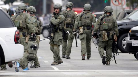 An FBI SWAT team arrives at the scene of a fatal shooting at the University of California, Los Angeles, Wednesday, June 1, 2016, in Los Angeles. (AP Photo/Nick Ut)