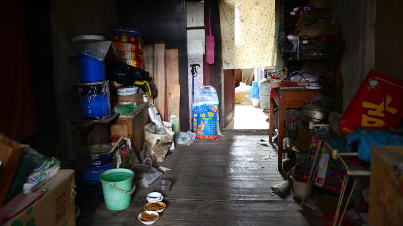 The site has since served as makeshift dorms for various institutions and residents. Most of the families now living inside it are empty nesters who've lived here for decades. Stock trading ceased when the Communist Party took over China. 