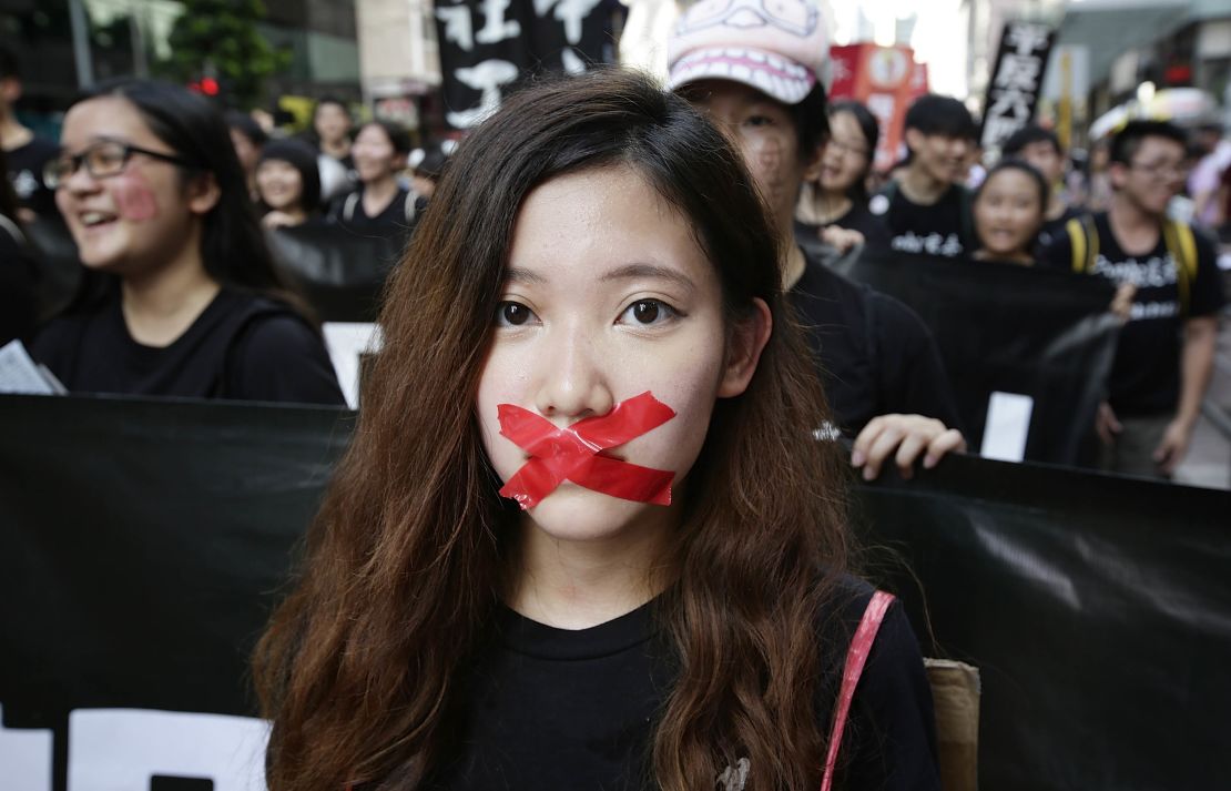 Pro-democracy activits march to mark the 25th anniversary of Tiananmen Square massacre, on June 1, 2014 in Hong Kong.