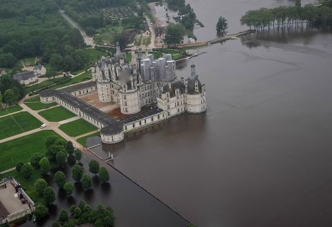An aerial photo shows flood waters around the 16-th century chateau of Chambord on June 2 after the Cosson burst its banks.