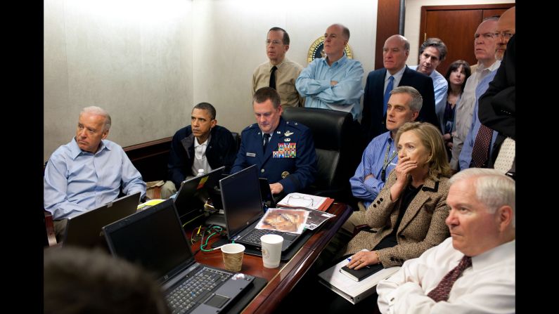 President Barack Obama, Vice President Joe Biden, then-Secretary of State Hillary Clinton and members of the national security team receive an update on the mission against Osama bin Laden in the Situation Room of the White House on May 1, 2011. 