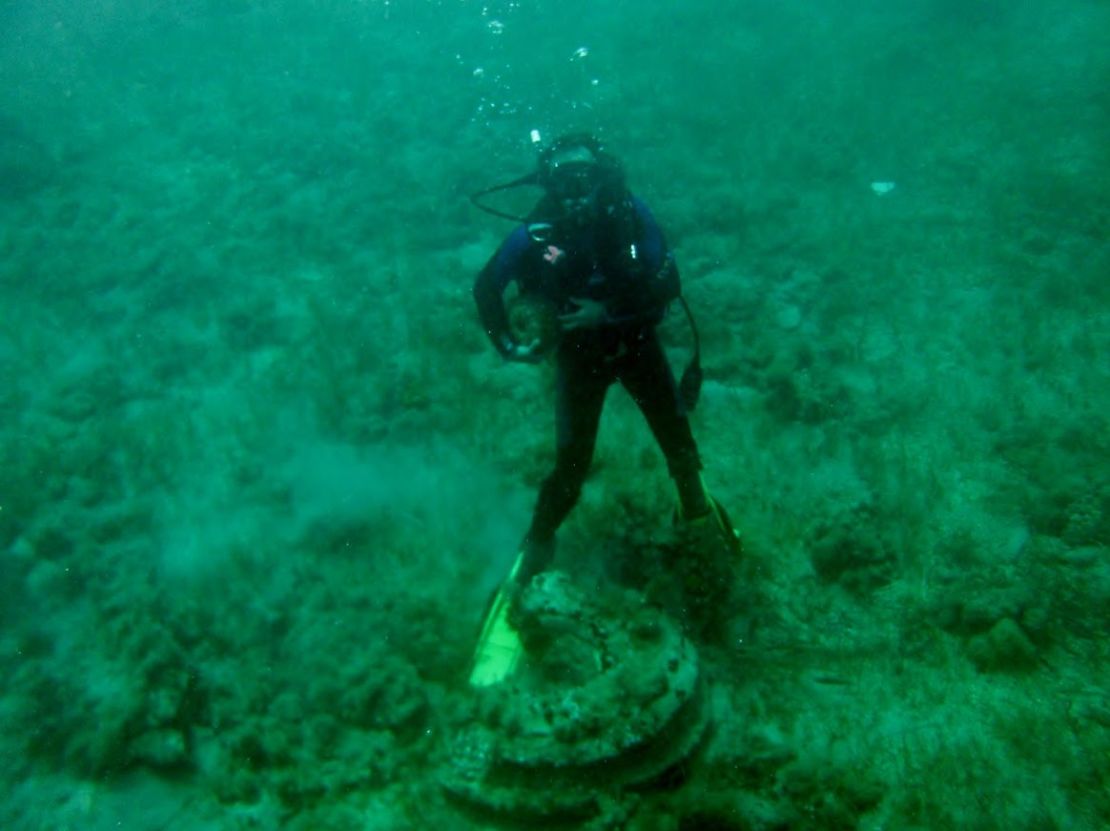 Research teams investigate the content and texture of the underwater formation.