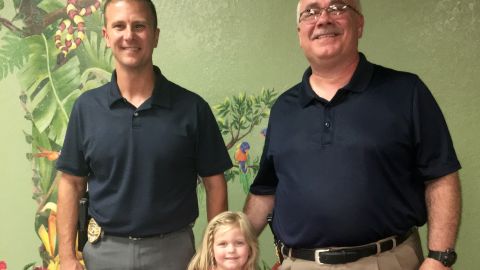 Detective Darrell Miller, left, and Maj. David Huff helped save Zoey Keating's life.