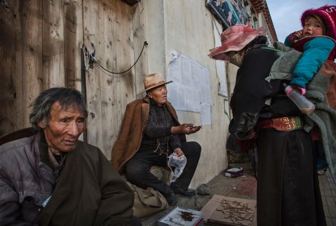 This year's harvest is expected to be the lowest on record, thanks to low rainfall.  This Tibetan nomad woman is selling what caterpillar fungus she's gathered to a dealer.  