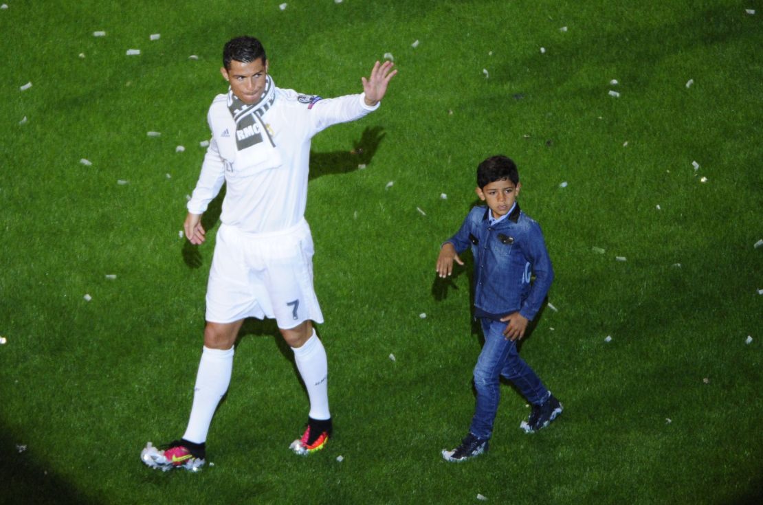 Ronaldo celebrates winning the Champions League with his son, Cristiano Jr.