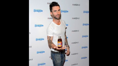Adam Levine, lead singer for the group Maroon 5, endorsing Snapple. A<a href="http://www.snapple.com/products/snapple-pink-lemonade" target="_blank" target="_blank"> bottle</a> of Snapple's Half and Half Tea has 50 grams of sugar, the daily limit <a href="http://www.cnn.com/2016/01/07/health/2015-dietary-guidelines/">recommended</a> by the new U.S. dietary guidelines.