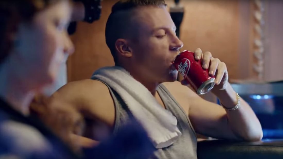 Rapper Macklemore drinks a Dr Pepper as part of his endorsement agreement. He's also signed with Cracker Jack.