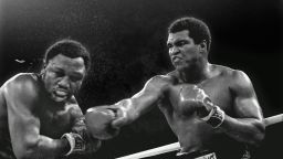 Muhammad Ali connects with a right in the ninth round challenger Joe Frazier during title fight in Manila, Philippines, October 1, 1975.  Ali won the fight on a decision to retain the title. 
