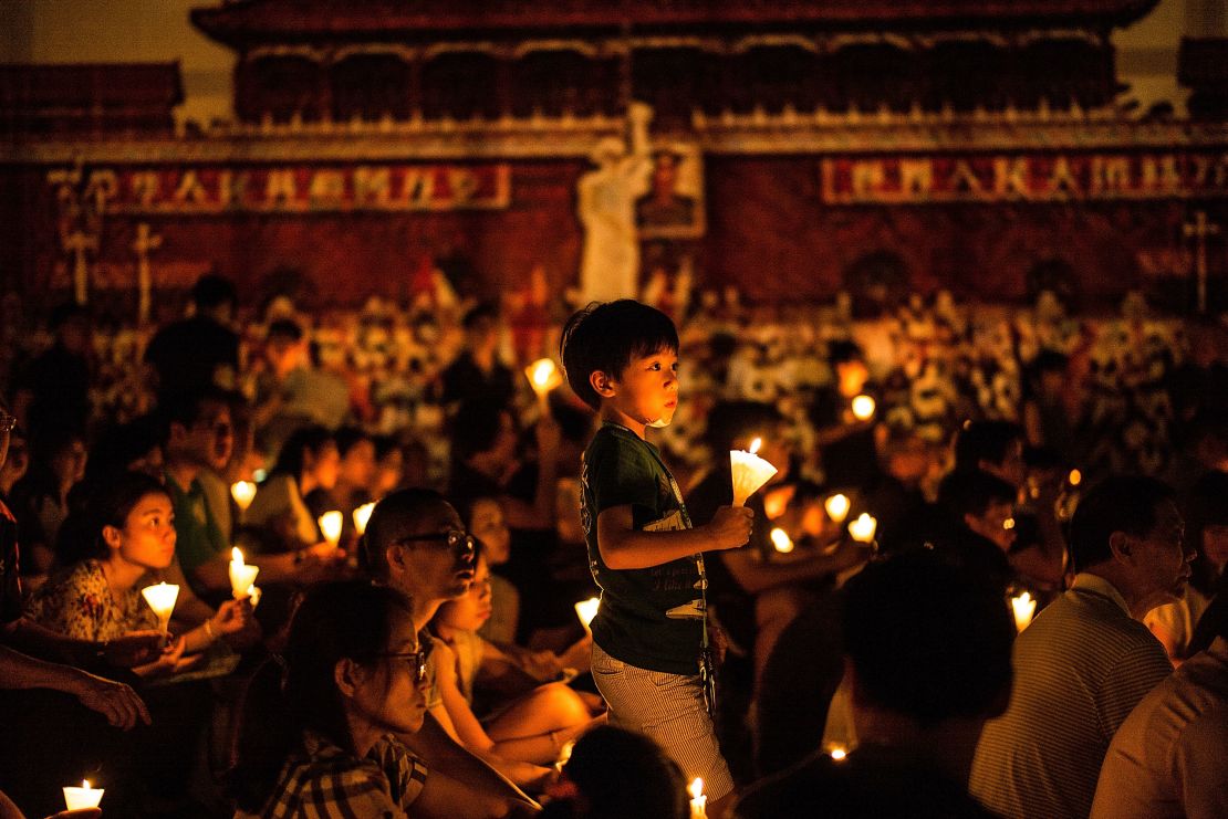 Thousands of people hold candles during a candlelight vigil on June 4, 2016 in Hong Kong, Hong Kong.