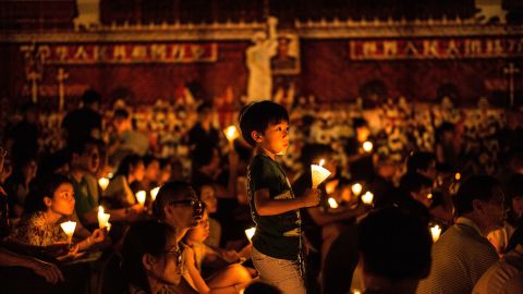 Thousands of people hold candles during a candlelight vigil on June 4, 2016 in Hong Kong, Hong Kong.