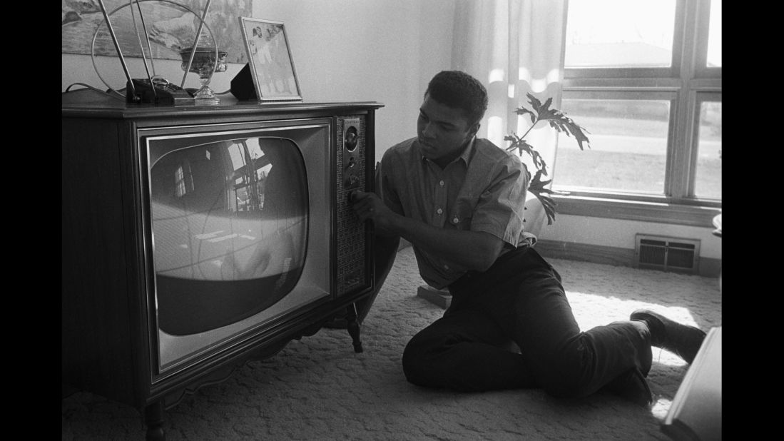 Ali watches TV in 1963. 