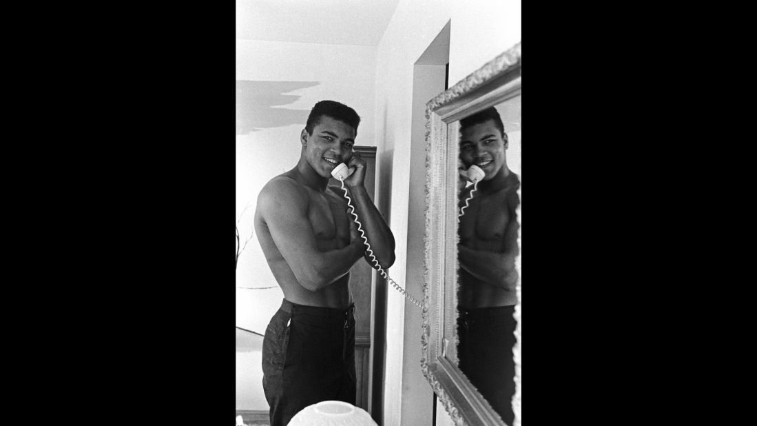 Ali -- then Cassius Clay -- on the phone at his Louisville home in 1960.