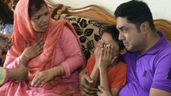 The family of Mahmuda Khanam Mitu, the wife of a top Bangladeshi anti-terror officer slain in the street, mourn her death Sunday.