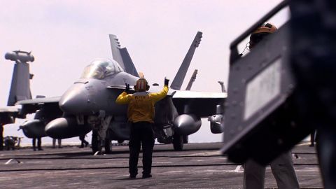 The USS Harry Truman's crew is under strain because their deployment has been extended by a full month.