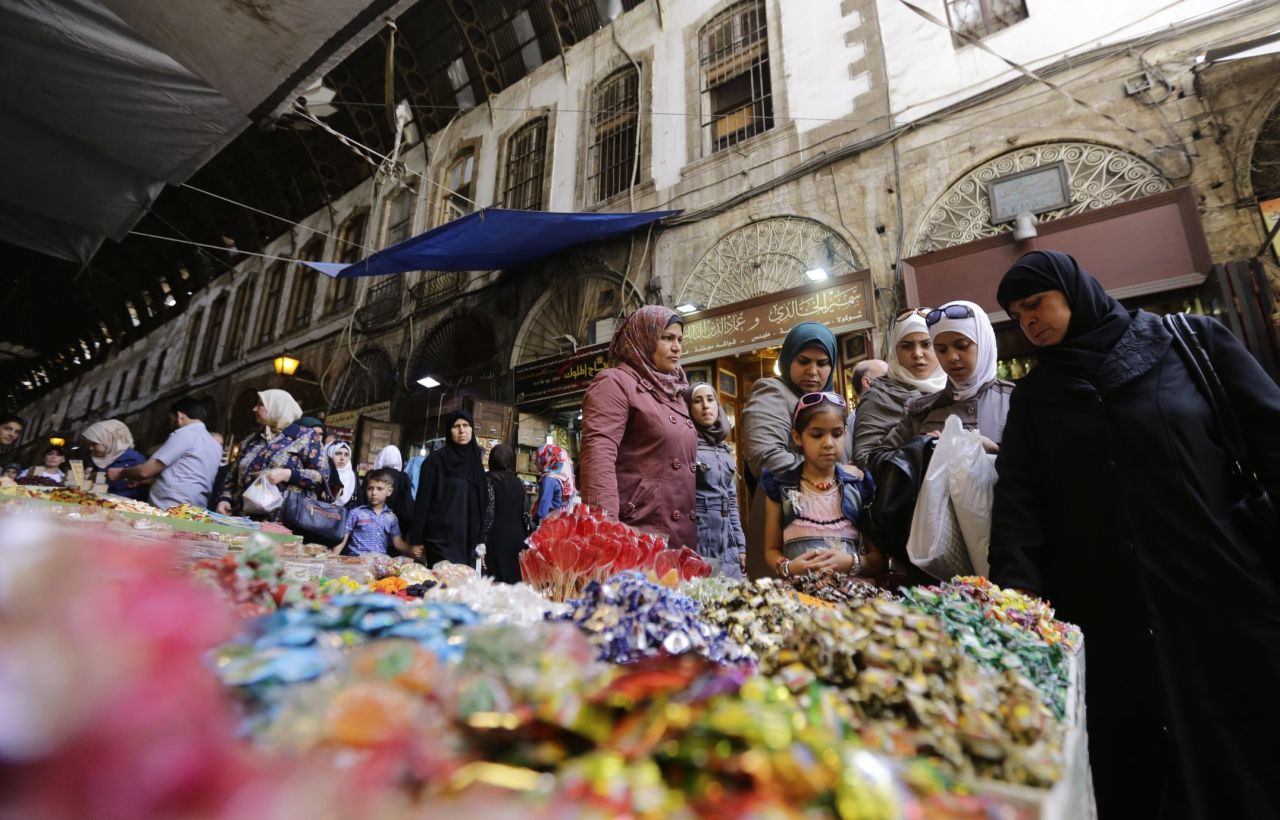 Women shop at a market in Damascus, Syria, on June 5.