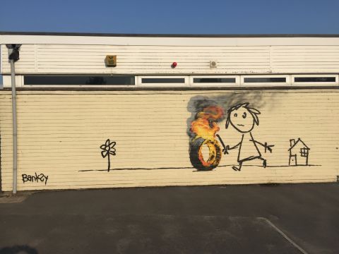 In June 2016 elusive UK street artist Banksy painted this mural for students at a primary school in his hometown of Bristol, England. Students had named a house at their school for the artist, who surprised them with the mural when they returned from a holiday break. Here's a look at some other notable Banksy works.