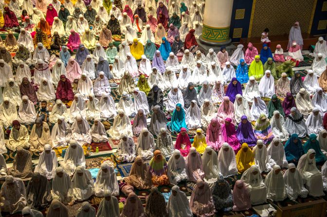 Muslims hold prayers at the al-Akbar mosque in Surabaya, Indonesia, to mark the start of Ramadan on June 5.