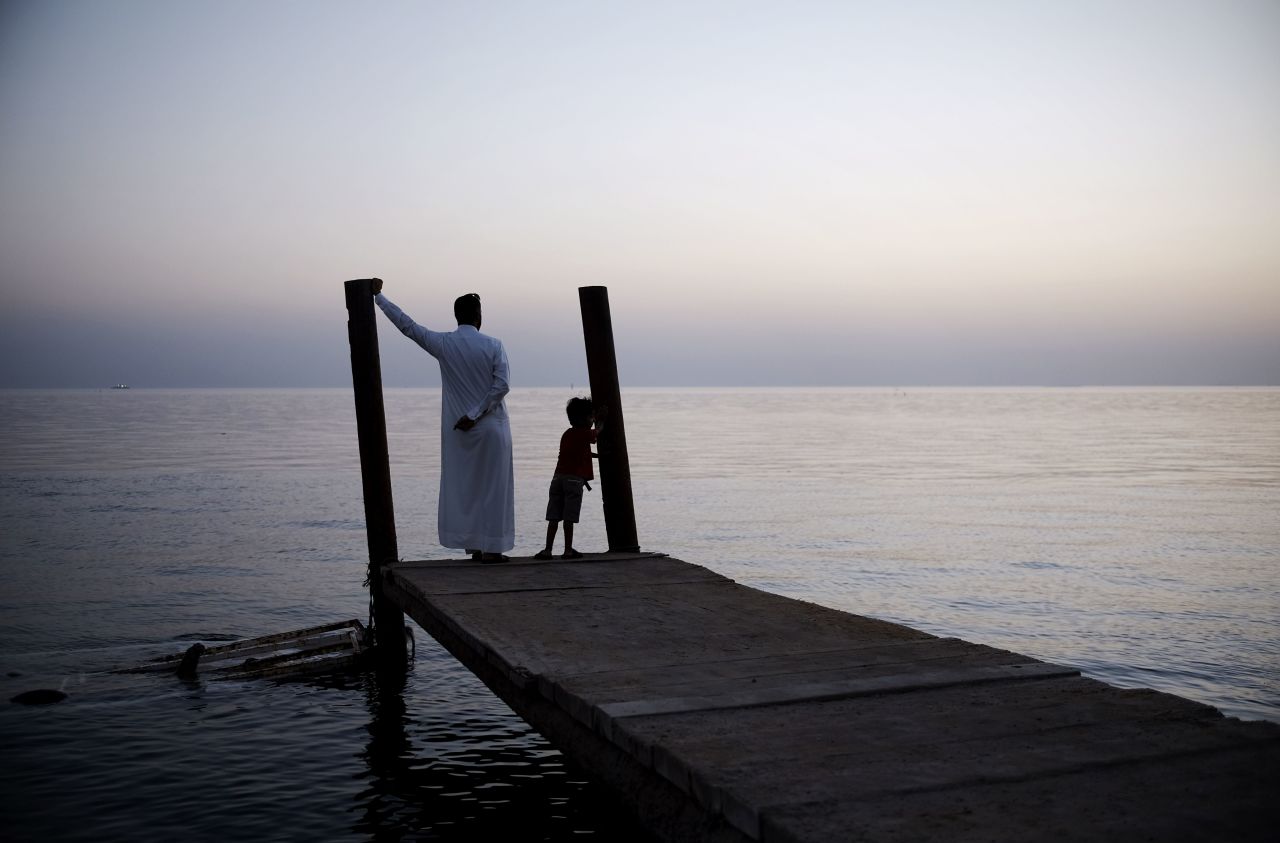 A man in Bahrain looks out for the first crescent moon that marks the start of Ramadan.