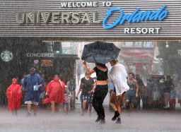 Guests arriving at the Universal Orlando theme park complex get pelted.