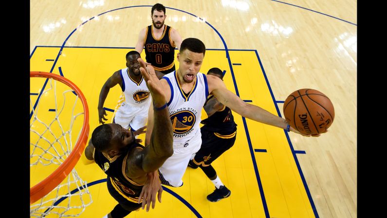 Golden State's Stephen Curry goes up for a shot over Cleveland's LeBron James during Game 2 of the NBA Finals on Sunday, June 5. Golden State, the league's defending champions, won the first two games of the best-of-seven series.