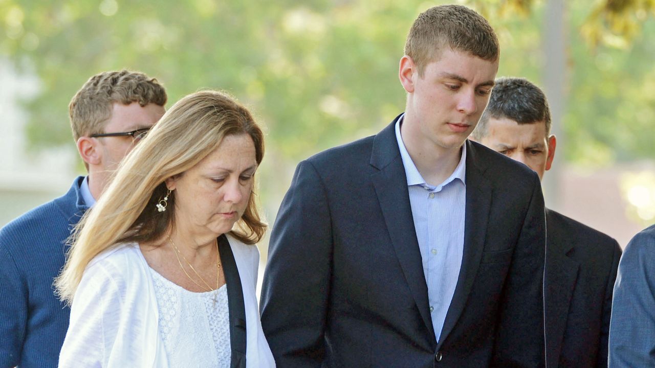 In this June 2, 2016 photo, Brock Turner, 20, right, makes his way into the Santa Clara Superior Courthouse in Palo Alto, Calif. The six-month jail term given to Turner, the former Stanford University swimmer who sexually assaulted an unconscious woman after both attended a fraternity party, is being decried as a token punishment. (Dan Honda/Bay Area News Group via AP) MAGS OUT NO SALES