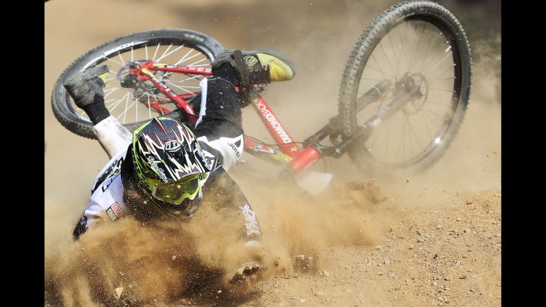 British mountain biker Jack Hudson crashes during the World Cup event in Fort William, Scotland, on Saturday, June 4.