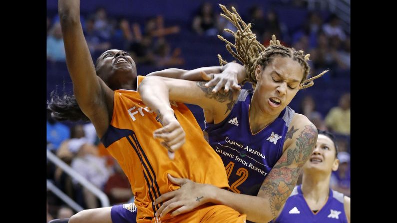 Connecticut's Chiney Ogwumike, left, is fouled by Phoenix's Brittney Griner during a WNBA game in Phoenix on Tuesday, May 31.