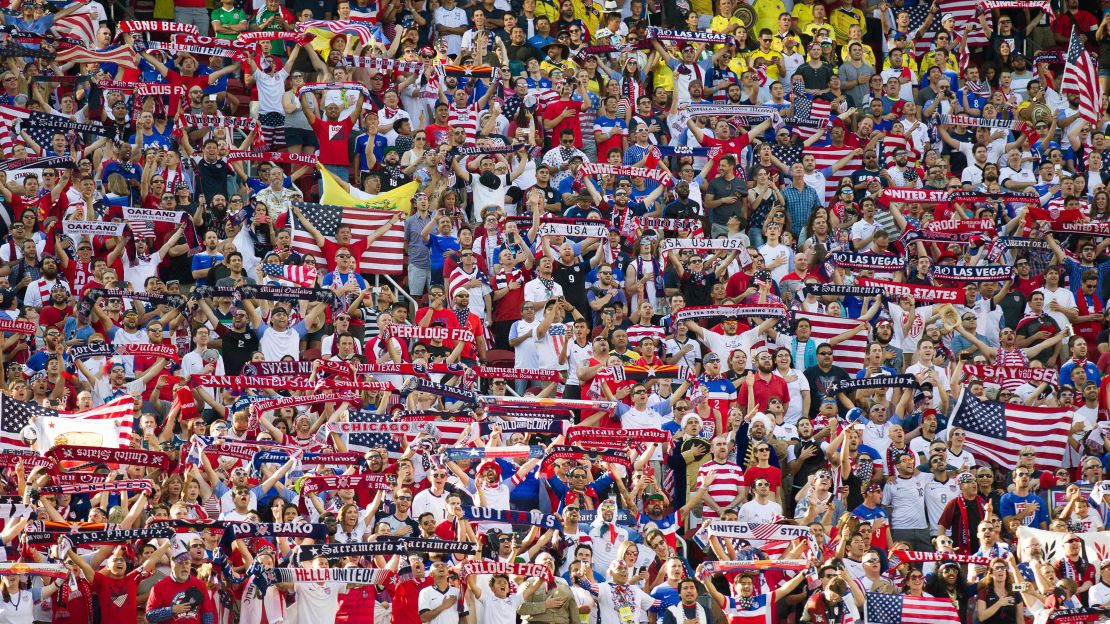 Fans of the U.S. men's soccer team hold scarves and flags before the opening game of the Copa America tournament on Friday, June 3. The Americans lost 2-0 to Colombia in Santa Clara, California.