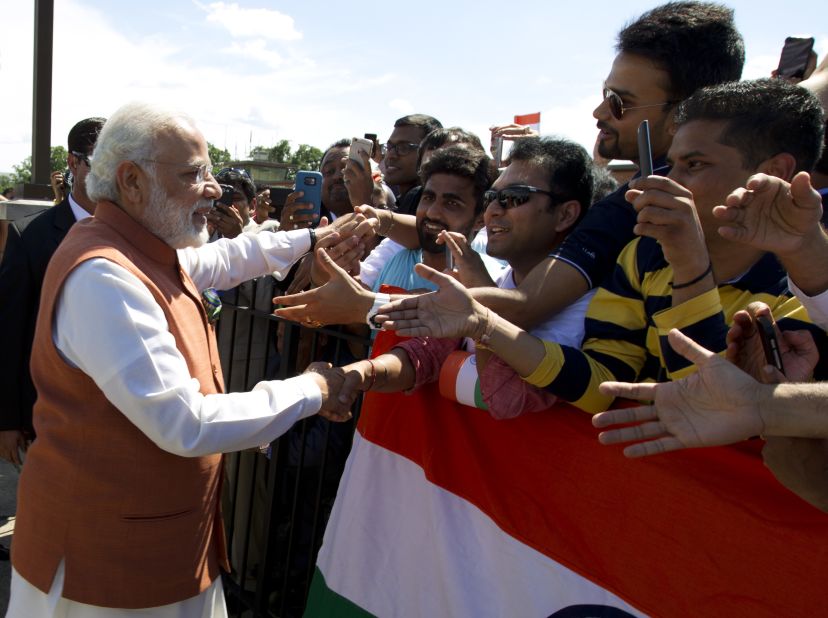 Modi shakes hands with supporters in Washington upon his arrival on June 6. 
