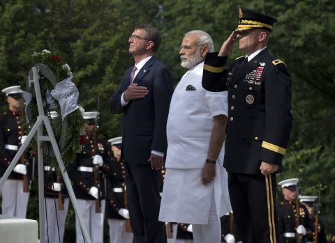 Modi is flanked by U.S. Secretary of Defense Ash Carter, left, and U.S. Army Maj. Gen. Bradley A. Becker.
