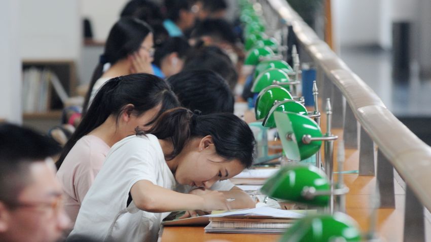 Chinese students review textbooks or write test papers to prepare for the upcoming National College Entrance Exam, also known as gaokao, at the Shanxi Library in Taiyuan city, north China's Shanxi province, 2 June 2016.

Some nine million students are preparing for the biggest test of their life: China's annual college entrance examination. Called the gaokao, or "high exam," it will take place over nine hours on June 7-8 across China. It's the culmination of years of memorization and test taking, capped off by at least 12 months of grueling preparation. With its roots in the imperial examinations that started more than 2,000 years ago, the gaokao decides what school you go to and what career you might have, says Xiong Bingqi, vice president at the 21st Century Education Research Institute in Shanghai. The gaokao is an especially high hurdle for China's more than 100 million rural students, who already receive an education of far lower quality than their urban counterparts. A quota system for allocating coveted college slots by province, which greatly favors local students, also works against rural youth who often live far from the better universities and need higher test scores than local applicants to gain admission. That means urban youth are 7 times as likely to get into a college as poor rural youth and 11 times as likely to get into an elite institution, according to economist Scott Rozelle, a Chinese education researcher at Stanford. "The current system itself is unfair," Xiong says. "Inequality is inevitable."
