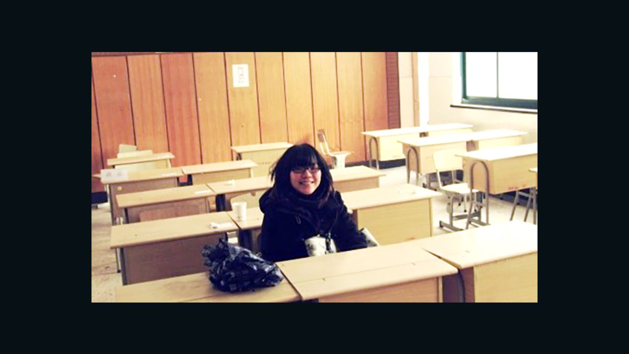Shen Lu revisits her old high school classroom in 2011, two years after taking the gaokao.