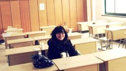 Shen Lu revisits her old high school classroom in 2011, two years after taking the gaokao.