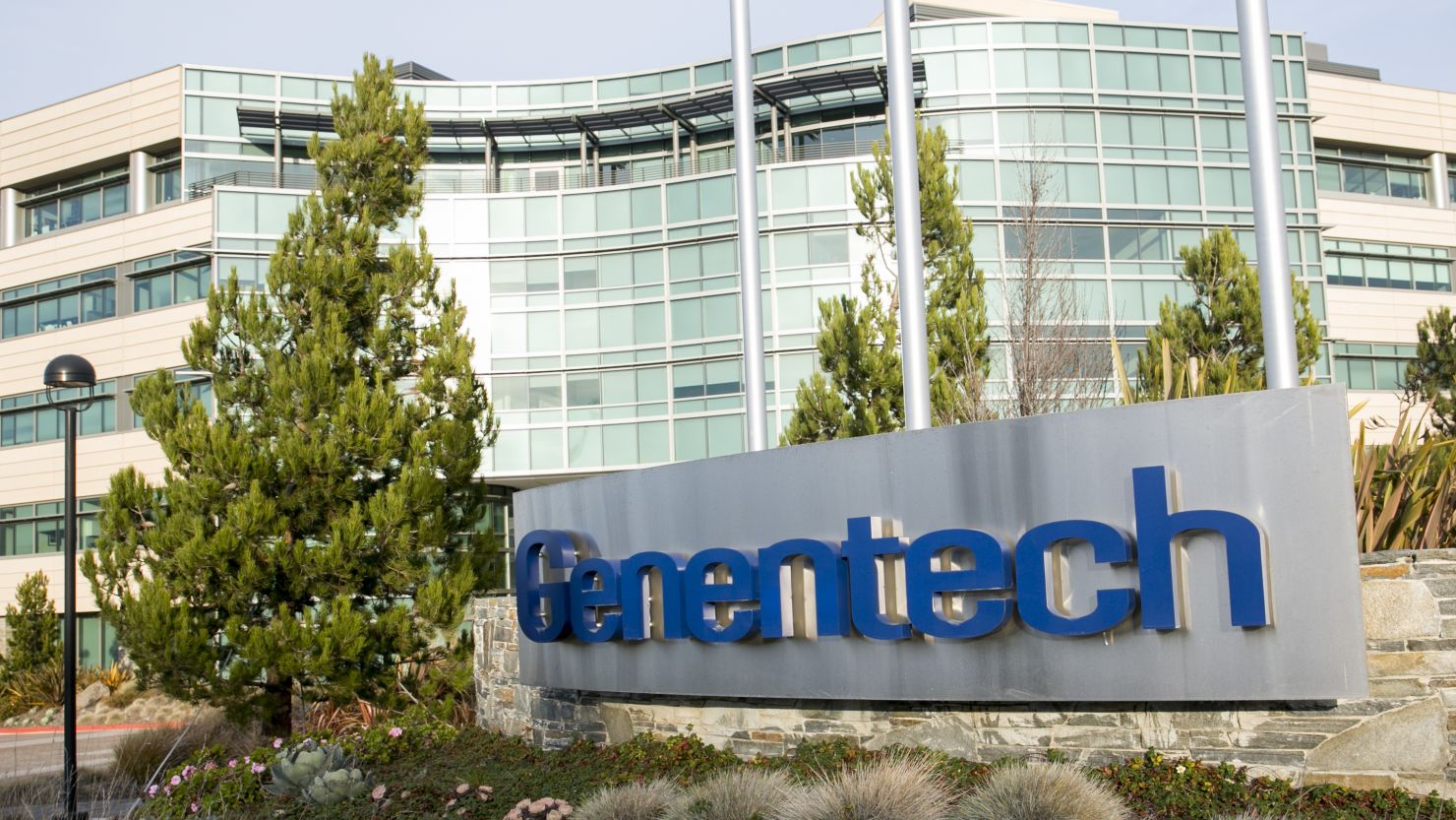 Genentech and OSI Pharmaceuticals will pay a $67 million settlement related to a lung cancer drug.