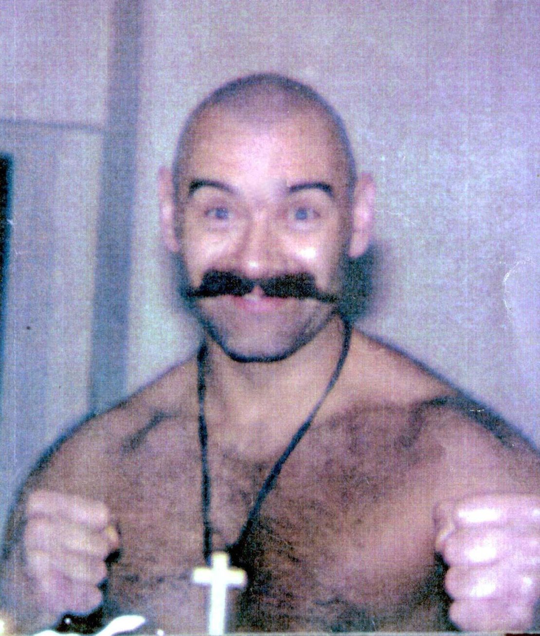 File photograph of Salvador, sporting his most famous look, the shaved head and moustache. 
