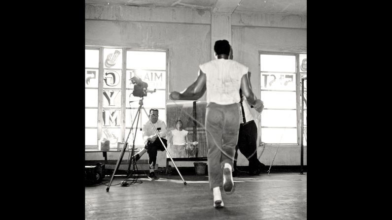 People at the 5th Street Gym watch Ali jump rope in December 1965. "At that point, photographers weren't taking pictures of athletes doing what they do behind the scenes," Kalinsky remembers. The photographer, now 80, has been with Madison Square Garden for more than 50 years. 