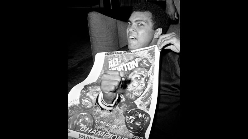 Ali poses with a poster for his 1976 fight against Norton. "The bottom line is that (Ali) was a great performer and he was a great athlete and he was a great entertainer," Kalinsky said. "And he was very playful. He always liked to do playful things, things that are a little different, things that would bring smiles to people's faces."