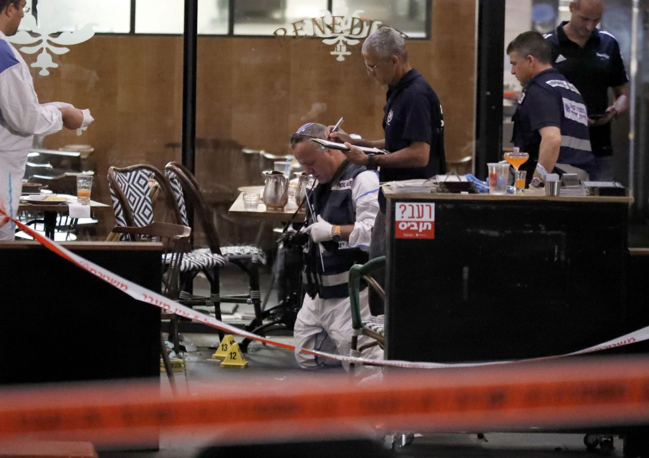 Four people were killed and nine others injured in the shooting, which took place at the Sarona Market near the Israeli Defense Ministry.
