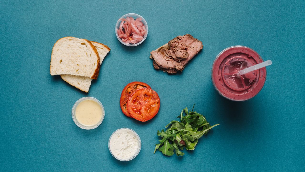 On your way to or from the gym? The steak and arugula sandwich (half) and a superfruit power smoothie is a healthy combination of performance-boosting nutrients including iron, protein and carbs.
