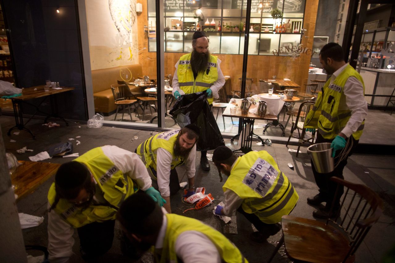 The attackers were dressed as Hasidic Jews, a law enforcement source briefed by Israeli officials said. Police officers shot one of the suspects. The other surrendered.