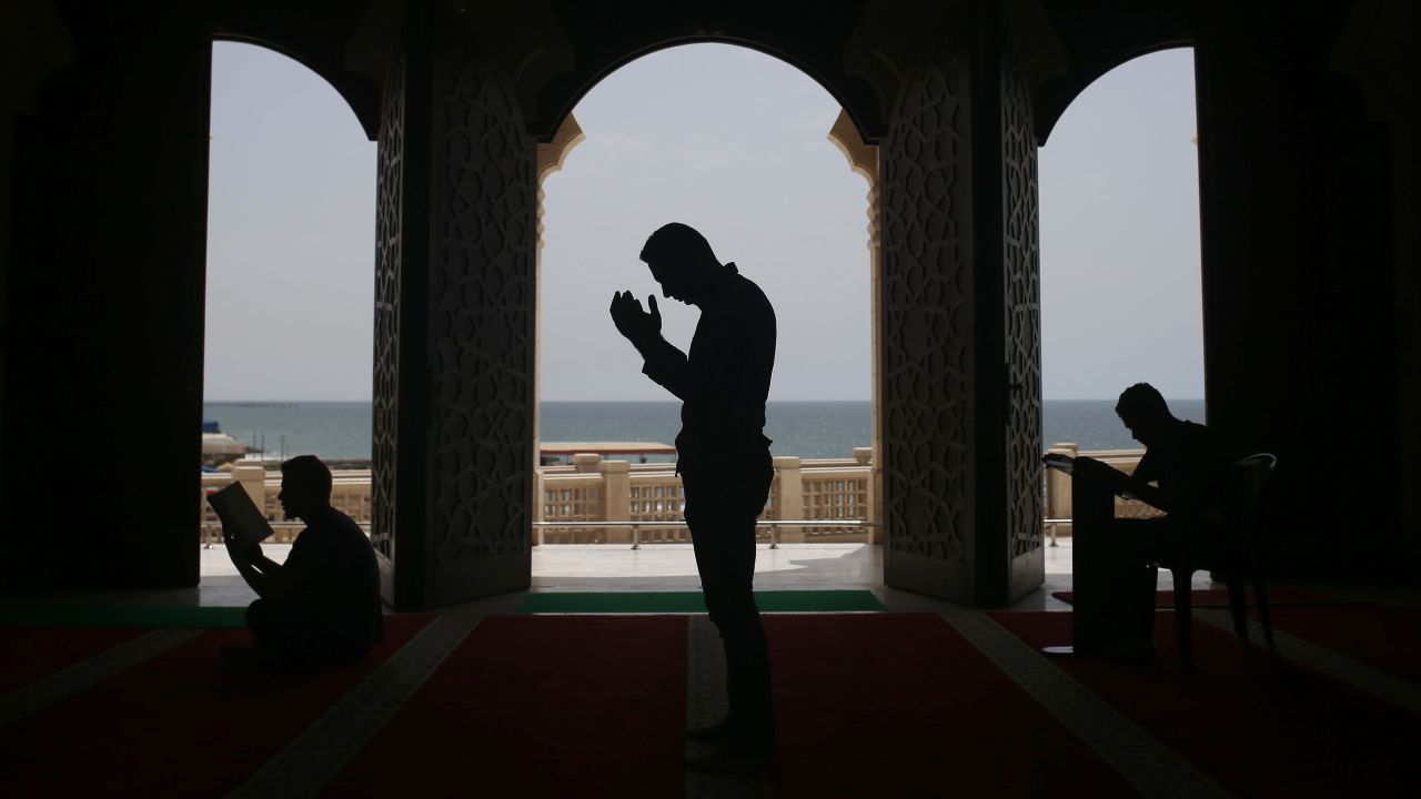 People pray at the al-Khaldi mosque in Gaza City on Wednesday, June 8.