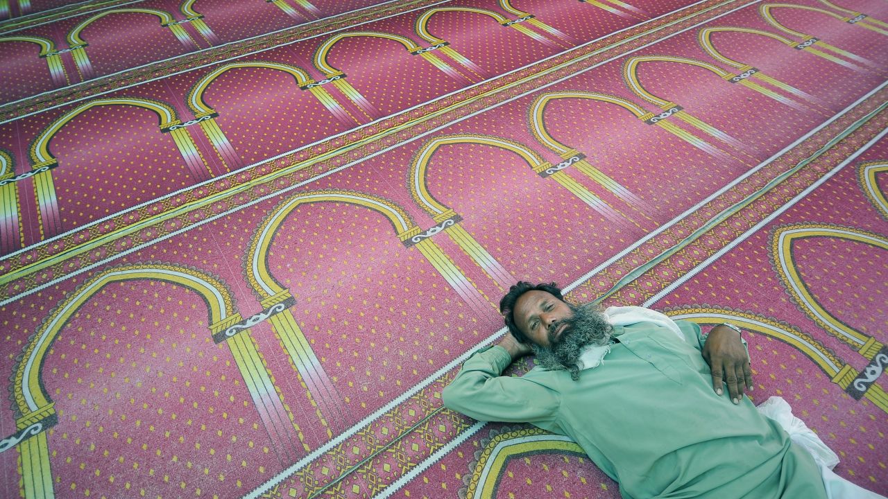 A man rests at a mosque in Kathmandu, Nepal, on June 9.