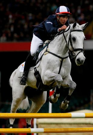 Alex Hua Tian, riding FBW Chico, clears a fence during the Express Eventing International Cup in Cardiff, Wales, in 2008.