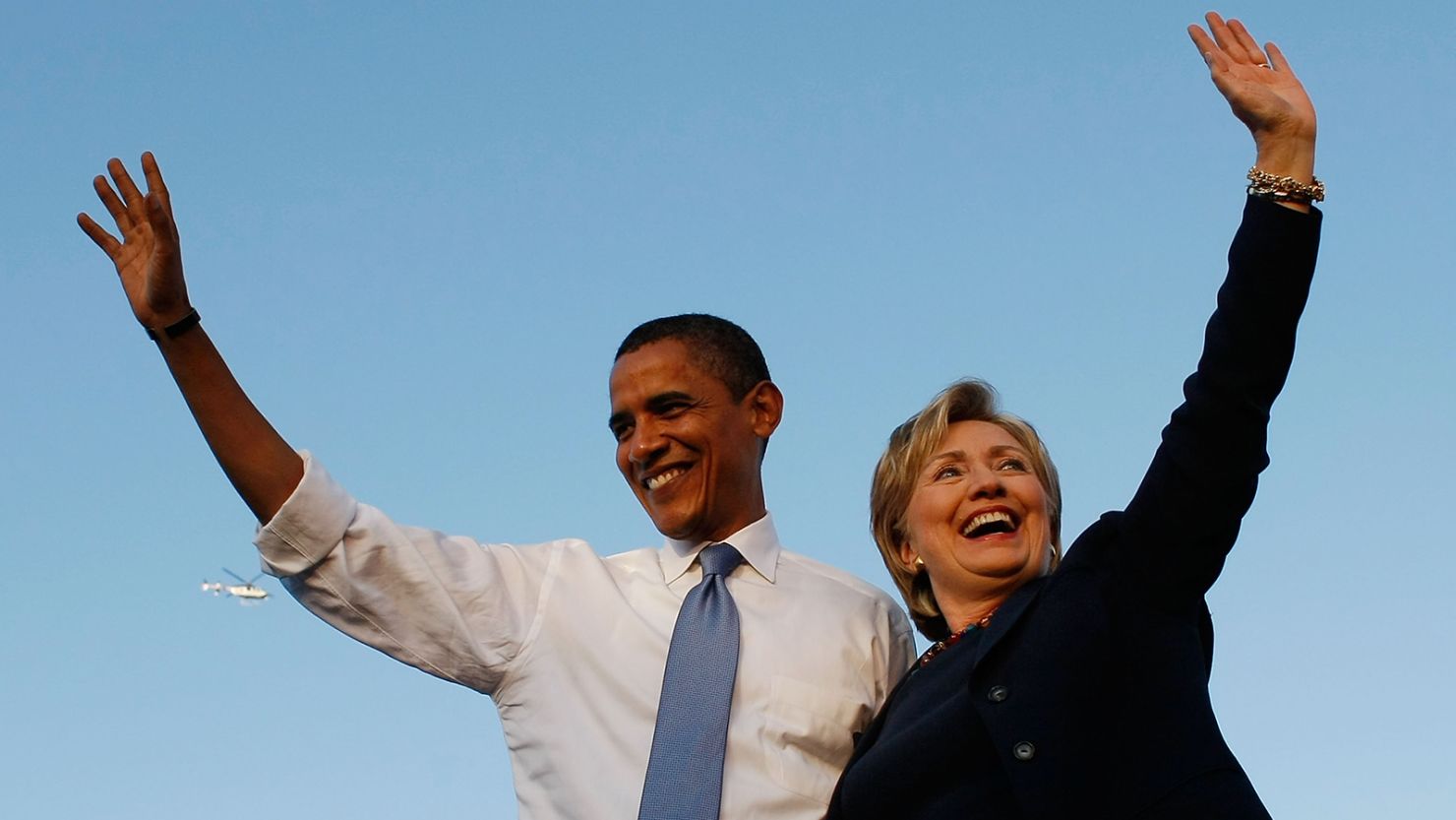 Democratic presidential nominee Barack Obama and Hillary Clinton attend a campaign rally together on October 20, 2008, in Orlando, Florida. 