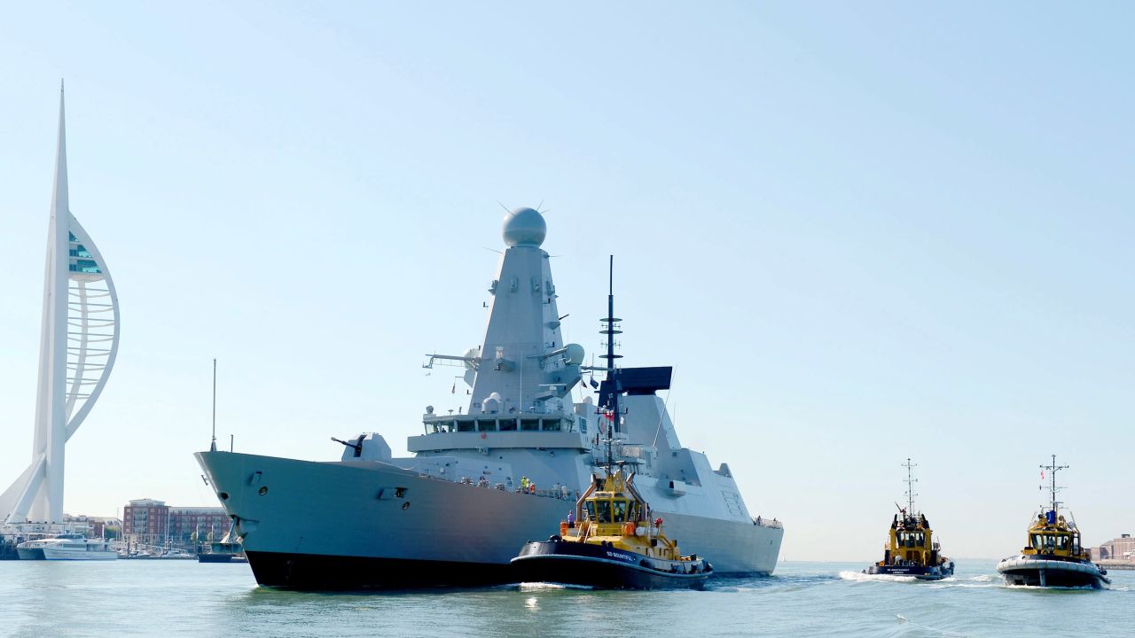 The Royal Navy's Type 45 Destroyer, HMS Defender sails into the HM Naval Base Portsmouth for the first time on July 25, 2012.