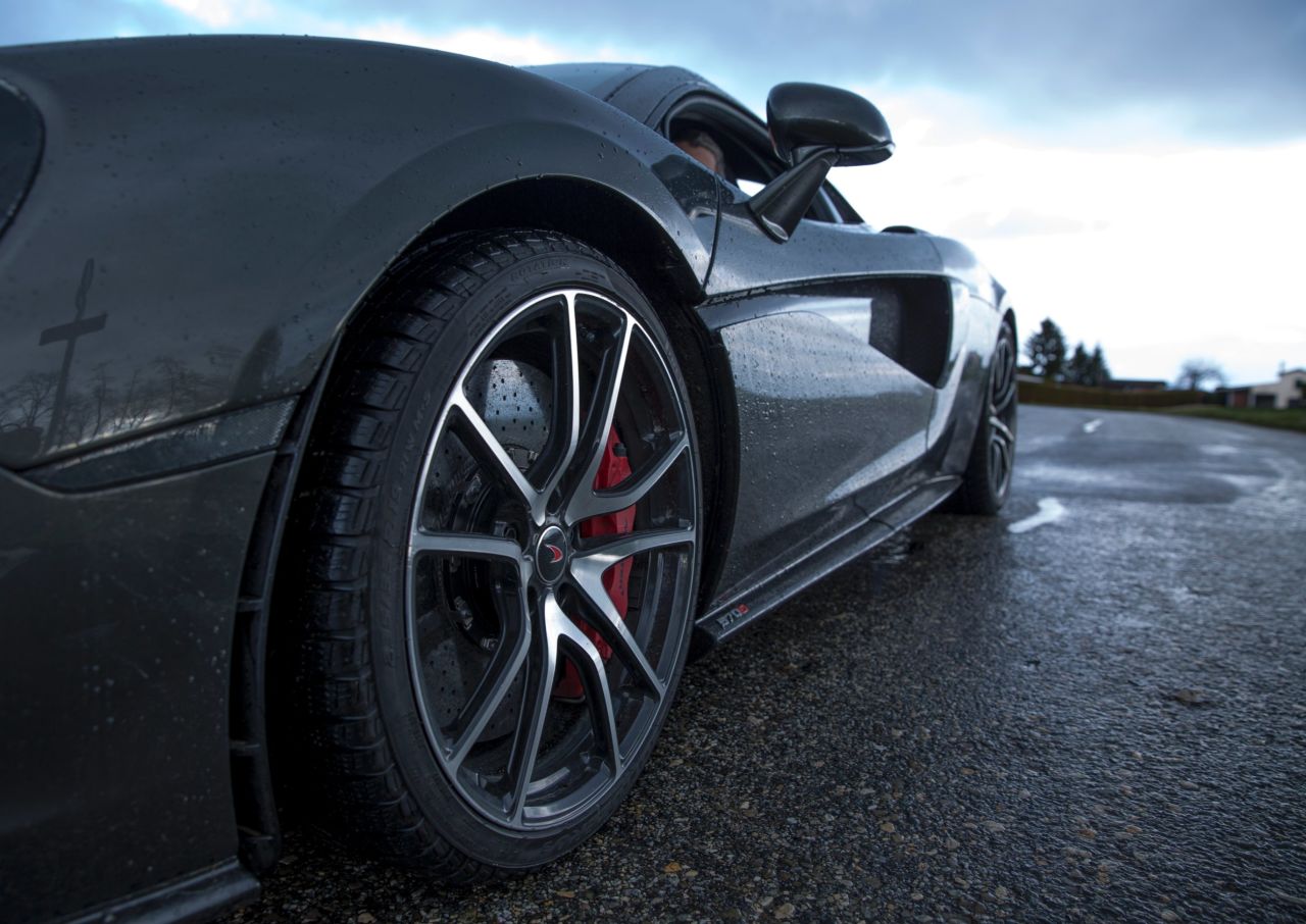 Scoops in the McLaren's dihedral doors usher air into the engine cooling system. 